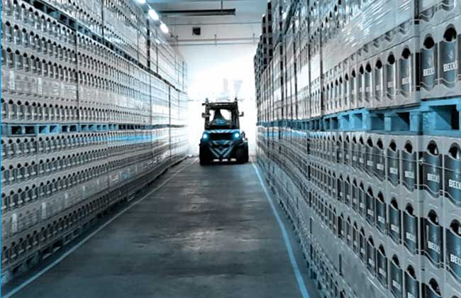 Image shows forklift in block storage aisle - RTLS localizes precisely here as well